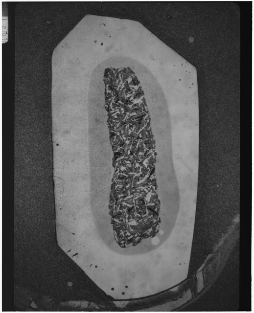 Black and white Thin Section photograph of Apollo 12 Sample(s) 12057,38 using cross nichols light.