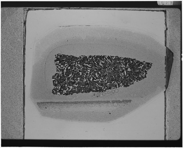 Black and white Thin Section photograph of Apollo 12 Sample(s) 12057,26 using cross nichols light.