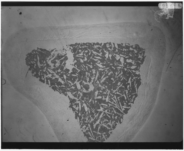 Black and white Thin Section photograph of Apollo 12 Sample(s) 12006,12 using cross nichols light.
