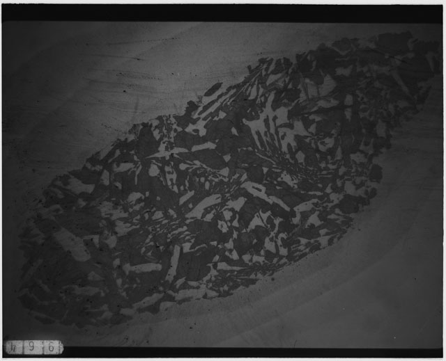 Black and white Thin Section photograph of Apollo 12 Sample(s) 12039,6 using cross nichols light.