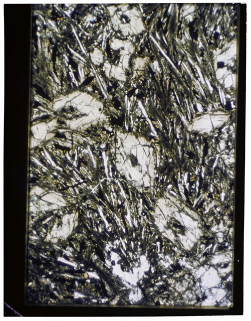 Color Thin Section photograph of Apollo 12 Sample(s) 12052,86 using transmitted light.