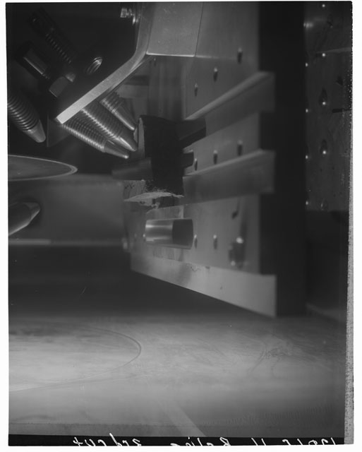 Black and white photograph of Apollo 12 Sample(S) 12065; Processing photograph displaying cutting slab.