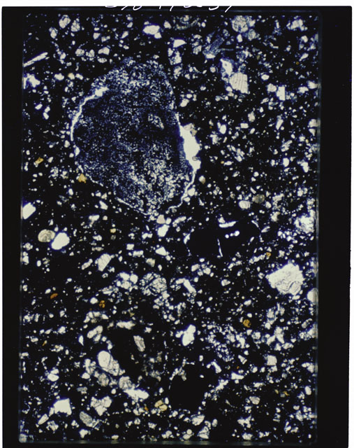 Color photograph of Apollo 11 Sample(s) 10019,2; Thin Section photograph using cross nichols light.