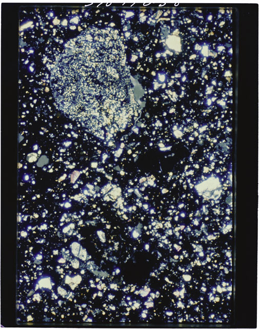 Color photograph of Apollo 11 Sample(s) 10019,2; Thin Section photograph using cross nichols light.