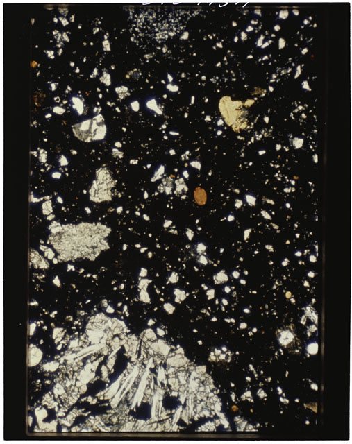 Color photograph of Apollo 11 Sample(s) 10046,65; Thin Section photograph using cross nichols light.