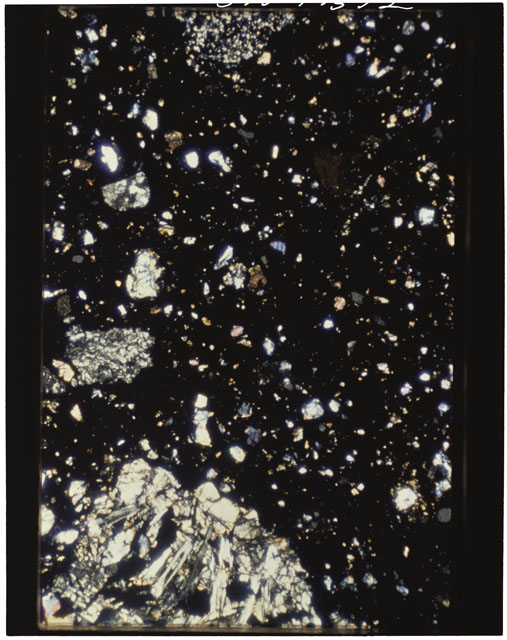 Color photograph of Apollo 11 Sample(s) 10046,65; Thin Section photograph using cross nichols light.
