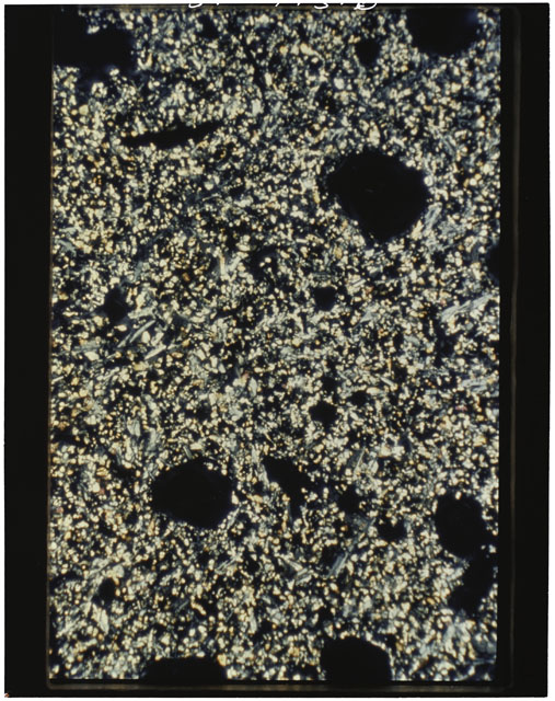 Color photograph of Apollo 11 Sample(s) 10085,99; Thin Section photograph using cross nichols light.