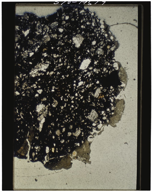 Color photograph of Apollo 11 Sample(s) 10085,96; Thin Section photograph using cross nichols light.