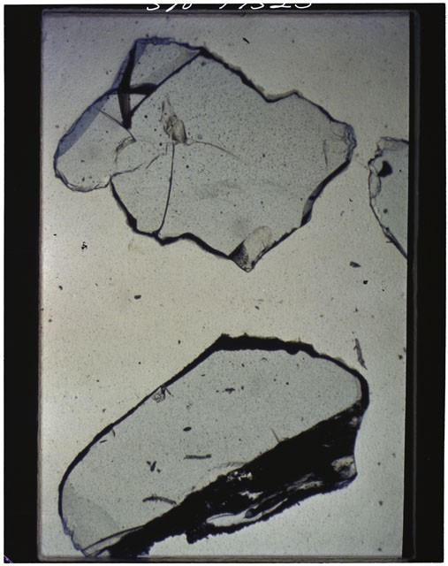 Color photograph of Apollo 11 Sample(s) 10085,93; Thin Section photograph using cross nichols light.
