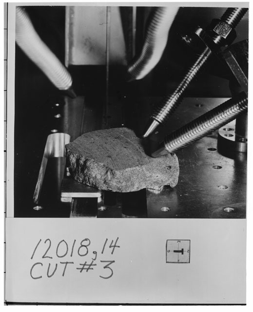 Black and white photograph of Apollo 12 Sample(S) 12018,14; Processing photograph displaying the orientation of cut #3.