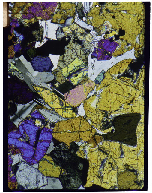 Color Thin Section photograph of Apollo 12 Sample(s) 12057,27 using cross nichols light.