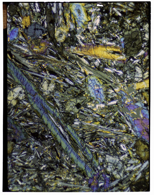Color Thin Section photograph of Apollo 12 Sample(s) 12065,12 using cross nichols light.