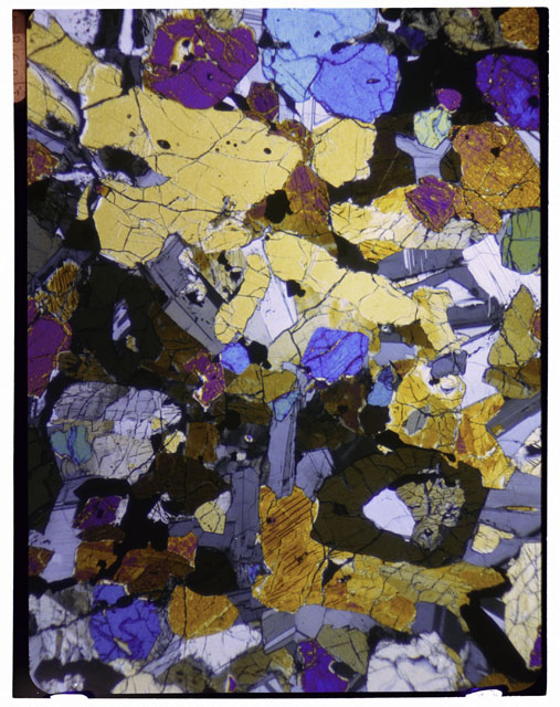 Color Thin Section photograph of Apollo 12 Sample(s) 12057,35 using cross nichols light.