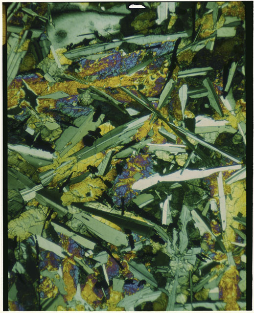 Color thin section photograph of Apollo 12 sample 12038,2 in cross nichols light.