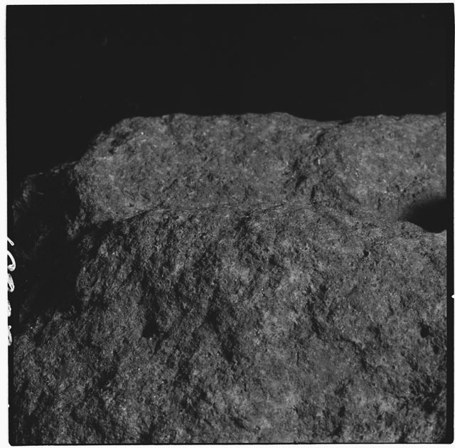 Black and white photograph of Apollo 12 sample 12063; Processing mosaic photograph displaying a close up of the surface.