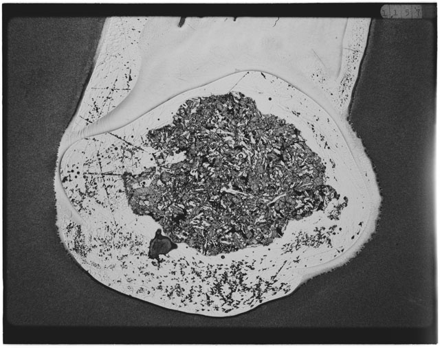 Black and white Thin Section photograph of Apollo 12 Sample(s) 12063,16 using cross nichols light.