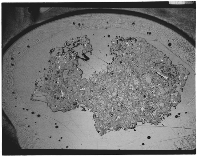 Black and white Thin Section photograph of Apollo 12 Sample(s) 12018,,8 using transmitted light.