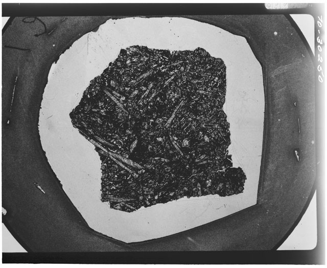 Black and white Thin Section photograph of Apollo 12 Sample(s) 12052,9 using cross nichols light.