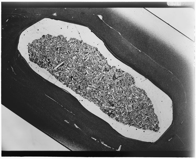 Black and white Thin Section photograph of Apollo 12 Sample(s) 12063,20 using cross nichols light.