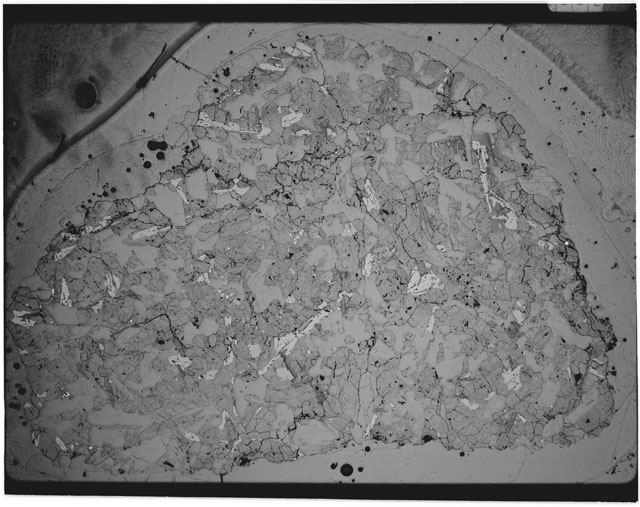 Black and white Thin Section photograph of Apollo 12 Sample(s) 12064,7 using transmitted light.