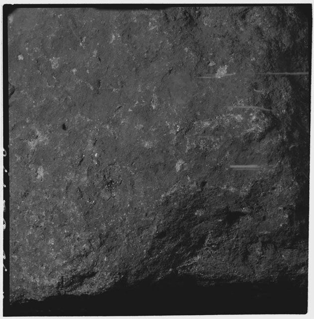 Black and white photograph of Apollo 12 sample 12022,0; Processing mosiac photograph displaying a close up of the surface.