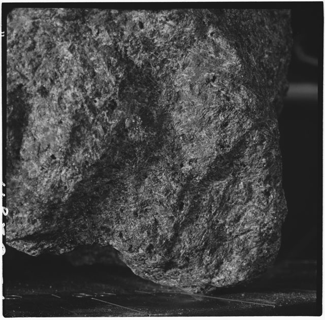 Black and white photograph of Apollo 12 sample 12021,0; Processing mosaic photograph displaying a close up of the surface.