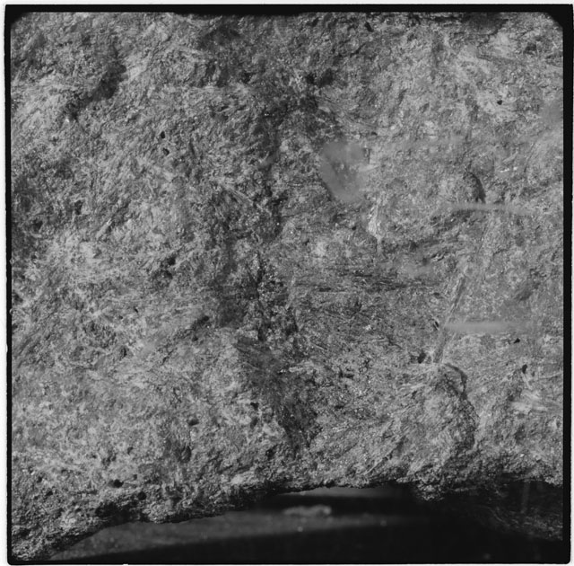 Black and white photograph of Apollo 12 sample 12021,0; Processing mosaic photograph displaying a close up of the surface.
