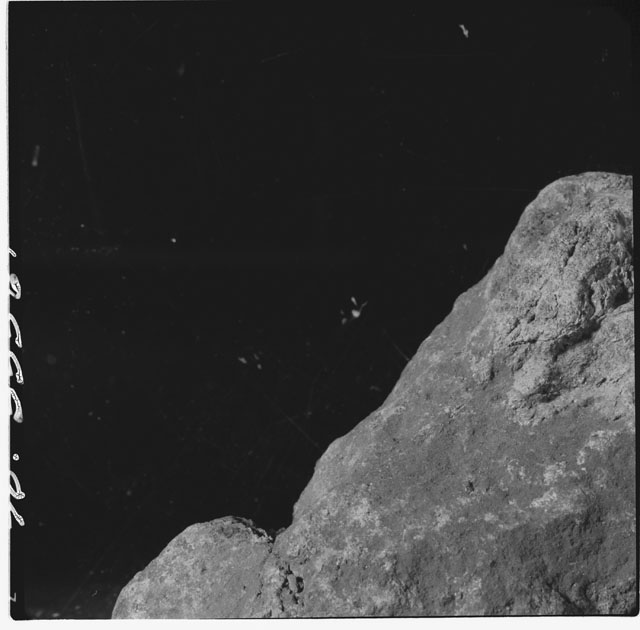 Black and white photograph of Apollo 12 sample 12010,0; Processing mosaic photograph displaying a close up of the surface.