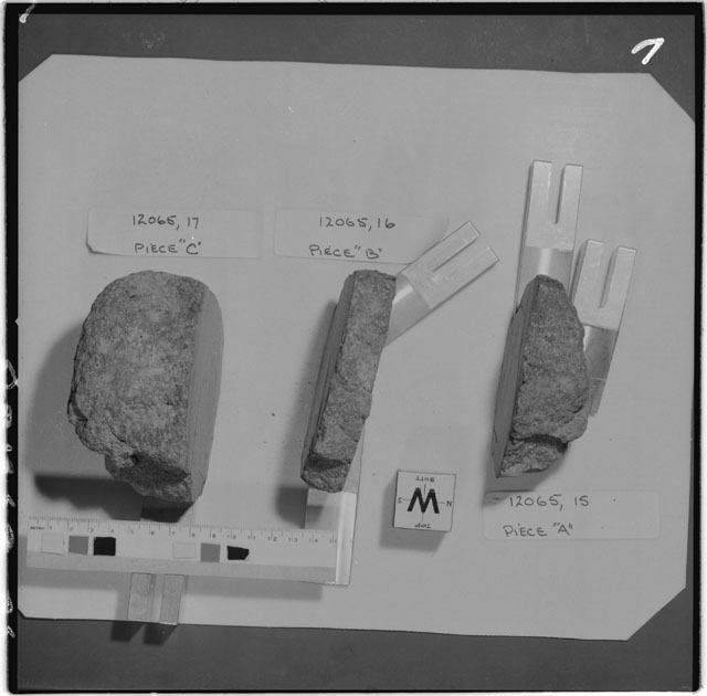 Black and white photograph of Apollo 12 Sample(S) 12065,16,17; Processing photograph displaying a slab reconstruction sample with an orientation of W.