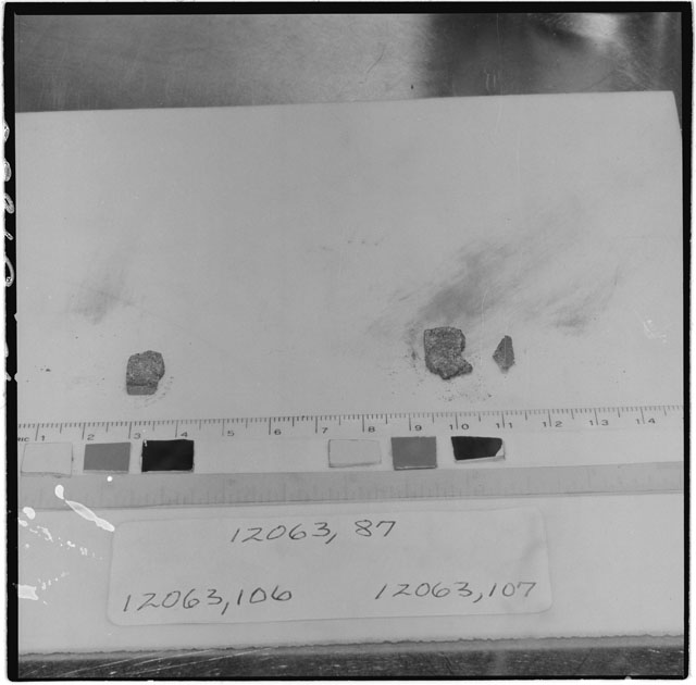 Black and white photograph of Apollo 12 Sample(S) 12063,87,106,107; Processing photograph displaying chip group.
