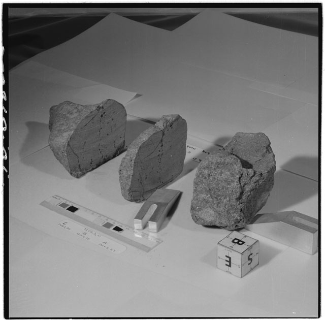Black and white photograph of Apollo 12 Sample(S) 12063,0,27-29; Processing photograph displaying a reconstruction sample with an orientation of B,S,E.
