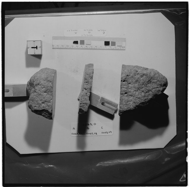 Black and white photograph of Apollo 12 Sample(S) 12063,0,27-29; Processing photograph displaying a reconstruction sample with an orientation of T.