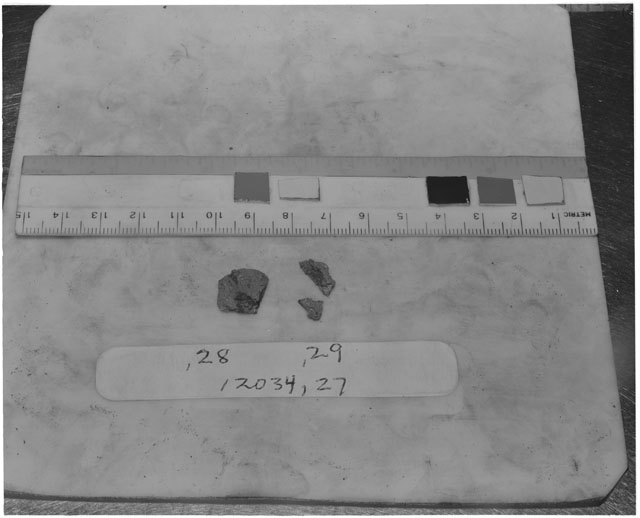 Black and white photograph of Apollo 12 Sample(S) 12034,28,29; Processing photograph displaying post chip group.