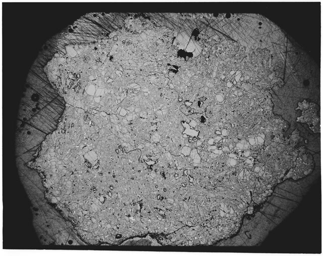 Black and white Thin Section photograph of Apollo 12 Sample(s) 12075,22 using reflective light.