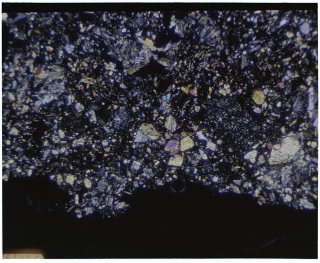 Color mosaic Thin Section photograph of Apollo 12 Sample(s) 12010,28 using cross nichols light.