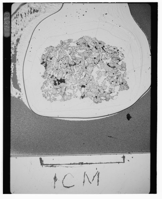 Black and white Thin Section photograph of Apollo 12 Sample(s) 12035,21 using cross nichols light.