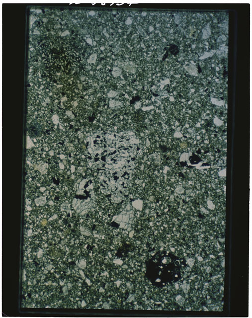 Color photograph of Apollo 11 Sample(s) 10019; Thin Section B photograph using reflected light.