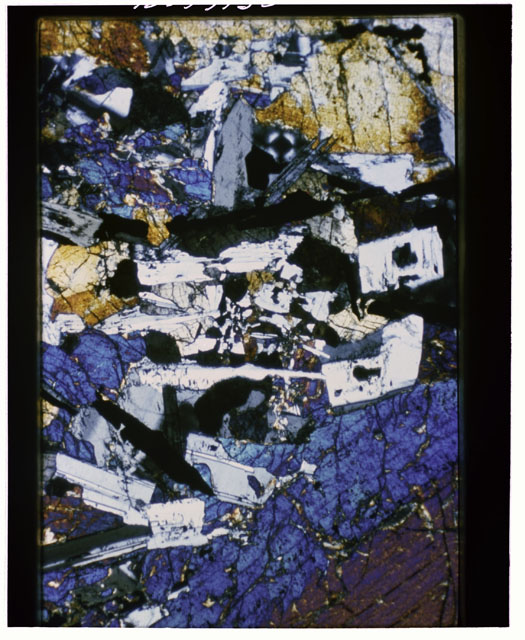 Color Thin Section photograph of Apollo 12 Sample(s) 12021,133 using cross Nichols light.