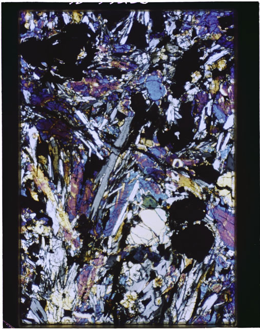 Color Thin Section photograph of Apollo 12 Sample(s) 12002,159 using cross nichols light.