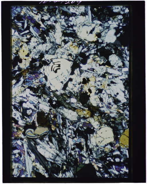 Color Thin Section photograph of Apollo 12 Sample(s) 12002,161 using cross nichols light.