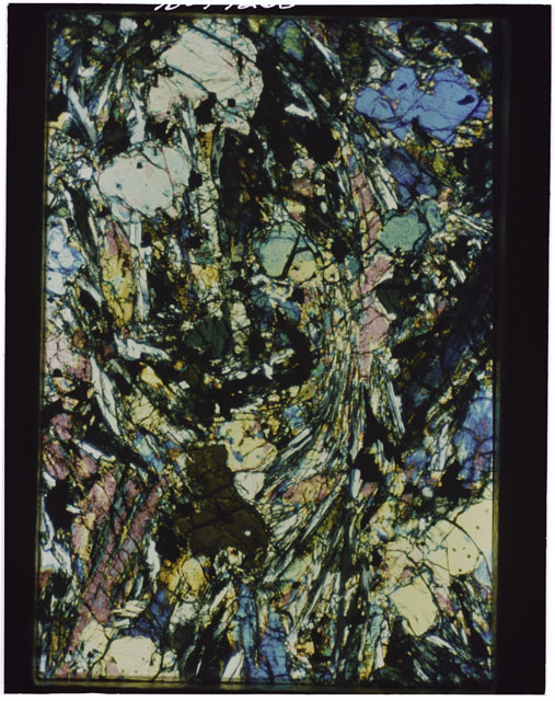 Color Thin Section photograph of Apollo 12 Sample(s) 12002,167 using cross nichols light.