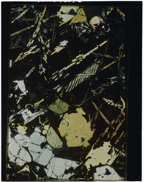 Color Thin Section photograph of Apollo 12 Sample(s) 12009,6 using cross nichols light.