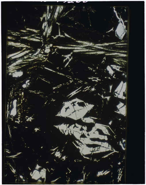 Color Thin Section photograph of Apollo 12 Sample(s) 12009,13 using transmitted light.