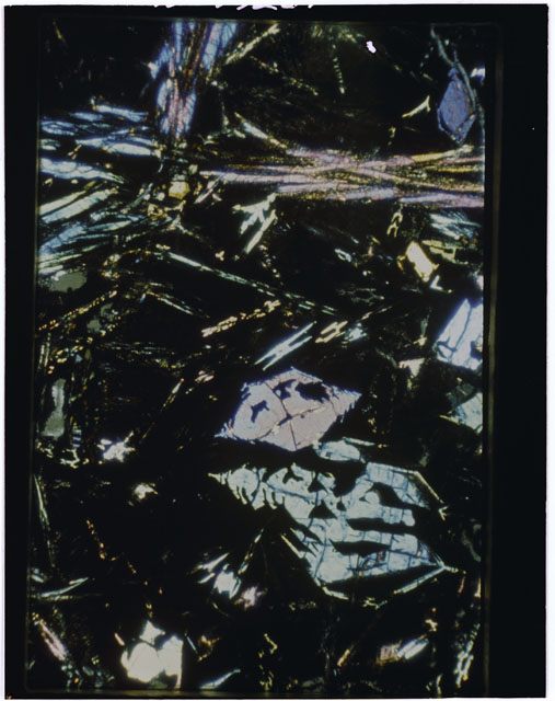 Color Thin Section photograph of Apollo 12 Sample(s) 12009,13 using cross nichols light.