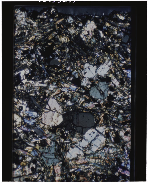 Color Thin Section photograph of Apollo 12 Sample(s) 12002,166 using cross nichols light.