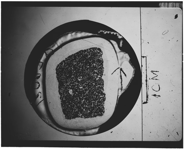 Black and white Thin Section photograph of Apollo 12 Sample(s) 12047,8 using cross nichols light.