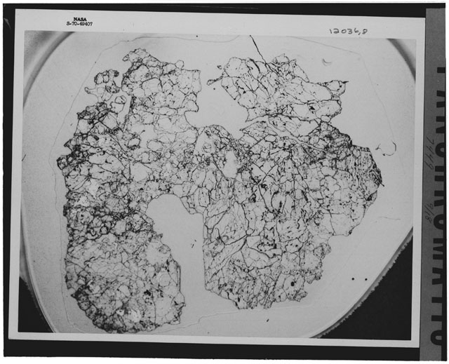 Black and white Thin Section photograph of Apollo 12 Sample(s) 12036,8 using reflective light.