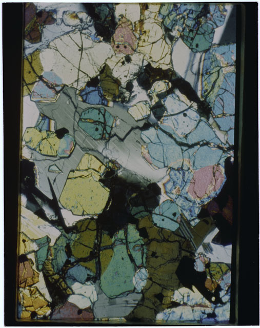Color Thin Section photograph of Apollo 12 Sample(s) 12040,43 using cross nichols light.