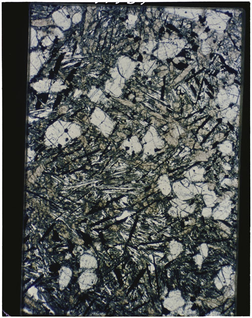 Color Thin Section photograph of Apollo 12 Sample(s) 12022,112 using transmitted light.