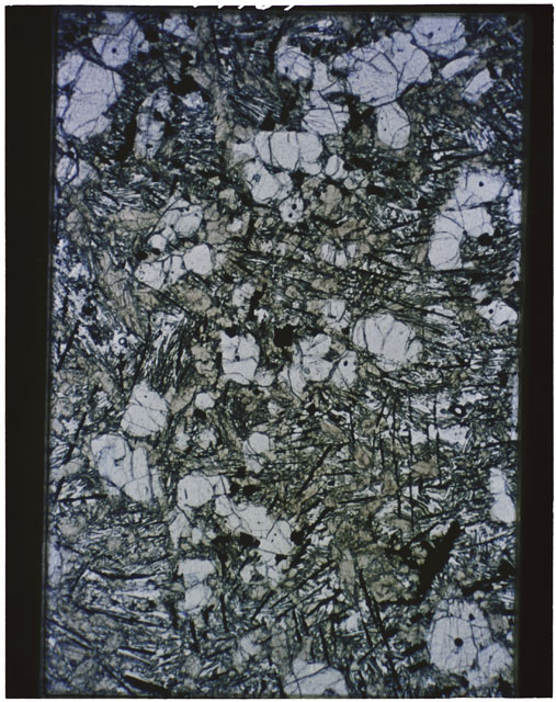 Color Thin Section photograph of Apollo 12 Sample(s) 12022,121 using transmitted light.